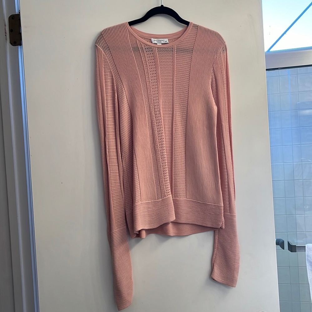 This beautiful equipment shirt is soft, comfortable stretchy material.